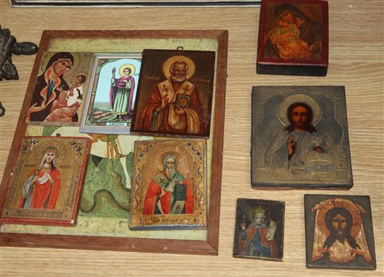 A group of nine early 19th/20th century Russian icons, largest 18.5 x 14cm and a print